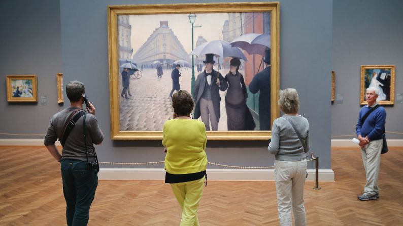 March in Chicago: Visitors look over "Paris Street; Rainy Day" by Gustave Caillebotte at the Art Institute of Chicago. Its collection is one of the most admired in the world and a perfect escape if Chicago is still showing its cold side in March.