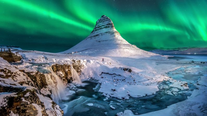 March in Iceland: The aurora borealis creates a surreal light show above Mount Kirkjufell on the north coast of Iceland's Snæfellsnes Peninsula.